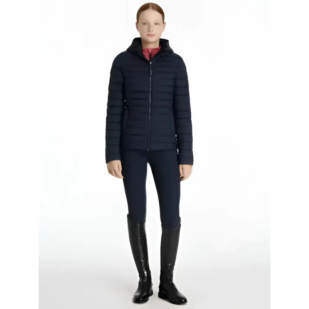 Navy blue quilted lemieux young rider ruby puffer jacket with hood and front zipper for cold weather use