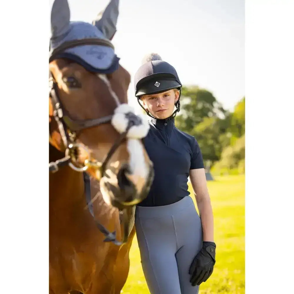 Navy blue lemieux young rider short sleeve base layer with high collar and subtle stitching perfect for young rider running