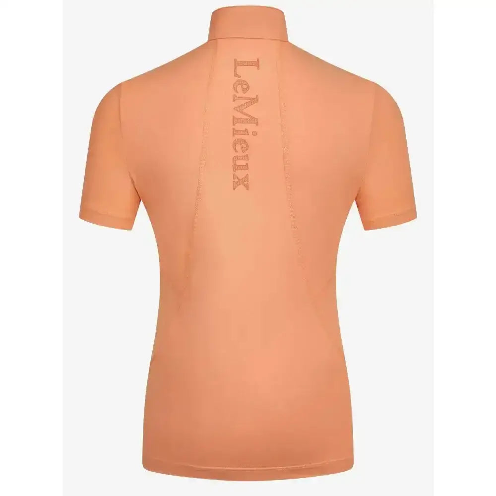 Back view of a peach lemieux young rider short sleeve base layer sherbet with vertical brand name embroidery