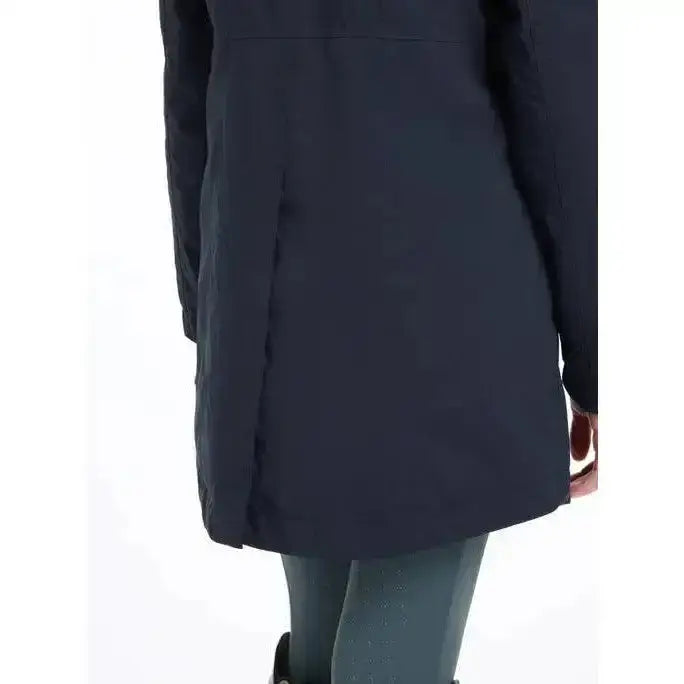 Dark navy blue lemieux young rider skye waterproof coat with subtle quilted texture and clean seam detailing