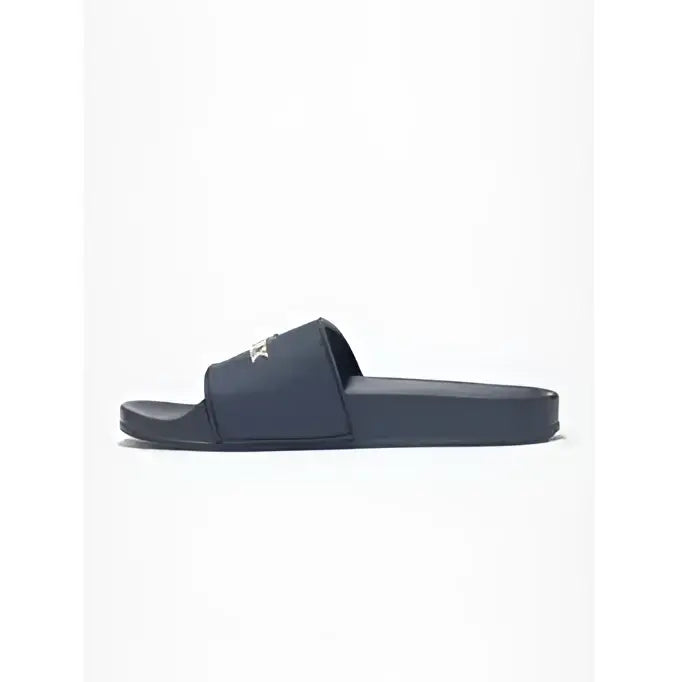 Black rubber lemieux young rider sliders dusk slide sandal with small white logo on strap for casual wear