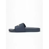 Black rubber lemieux young rider sliders dusk slide sandal with small white logo on strap for casual wear