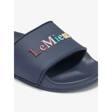Navy blue rubber lemieux young rider sliders dusk sandal with colorful embroidered lemieux logo