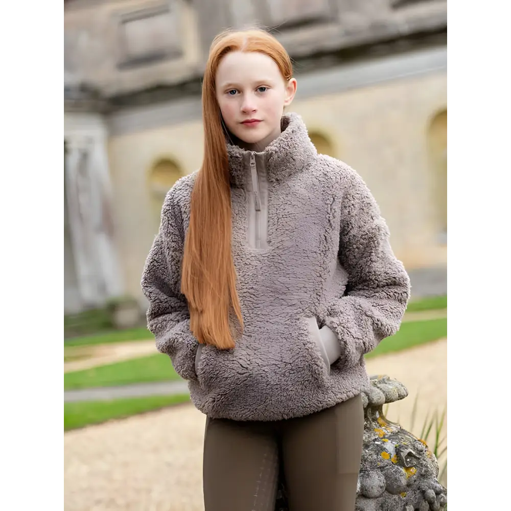 Young woman with long red hair in Lemieux Tia Teddy Fleece Ash pullover