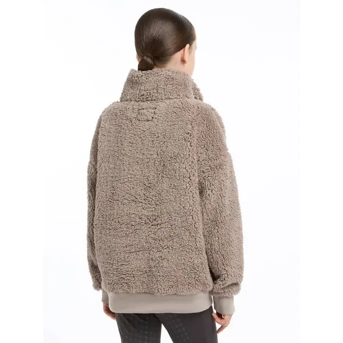 Fluffy beige Tia Teddy fleece jacket with a high collar, shown from the back