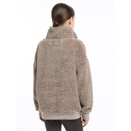 Fluffy beige Tia Teddy fleece jacket with a high collar, shown from the back