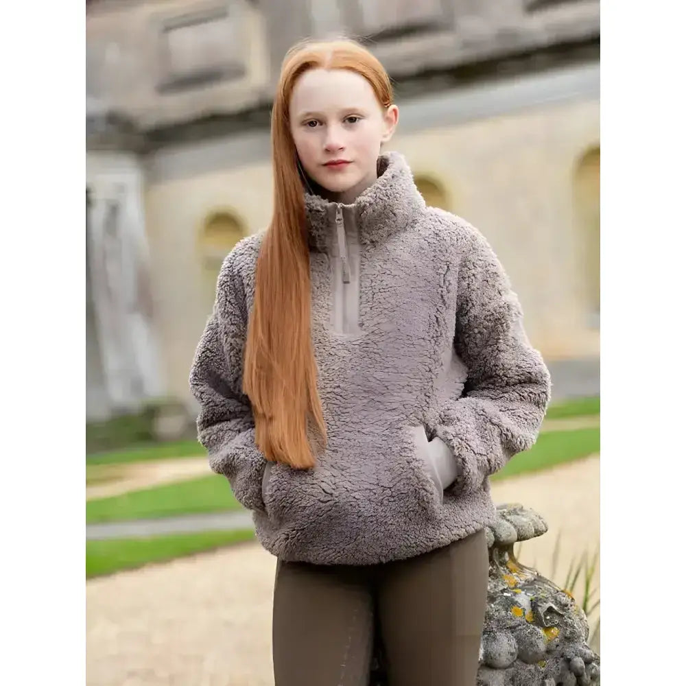 A cozy ash gray lemieux young rider tia teddy fleece jacket with high collar and half-zip front
