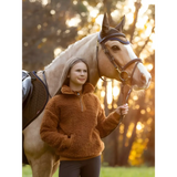 Horse with a brown and white coat in a bridle wearing Tia Teddy Fleece Ginger