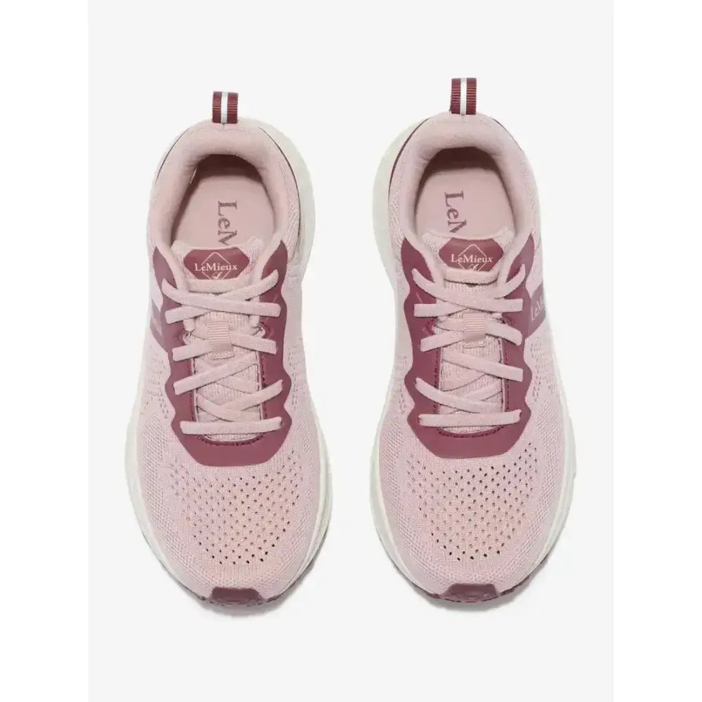 Pair of lemieux youth trainer blossom sneakers in blush pink and maroon with breathable mesh for equestrian use