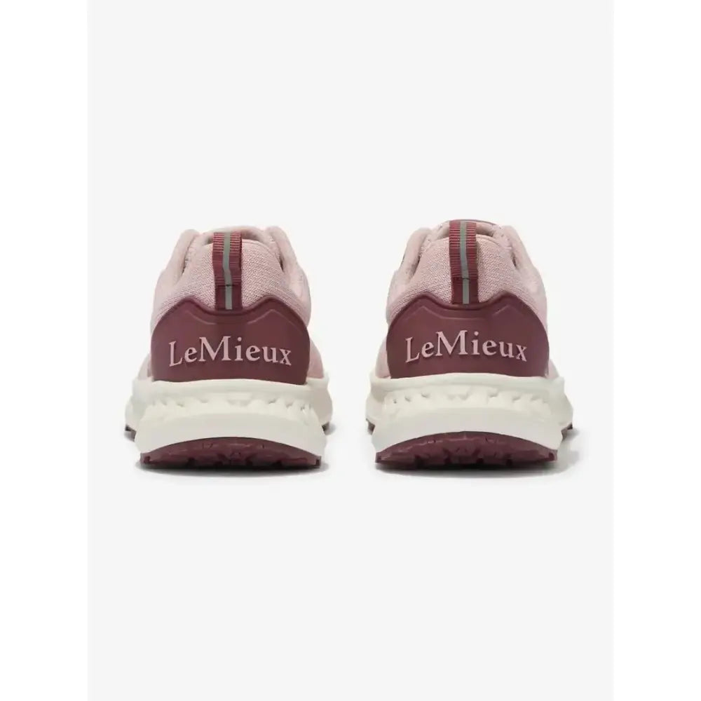 Pair of lemieux youth trax-lite trainer blossom sneakers in blush pink and maroon with textured upper for equestrian use