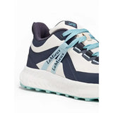 White and navy blue lemieux youth trax viva waterproof trainer with teal laces and textured rubber sole