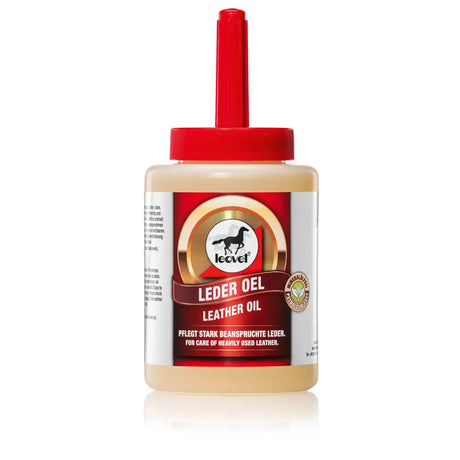 Red-capped leovet leather oil bottle with creamy beige liquid and horse logo label for leather care