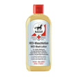 A clear plastic bottle with red cap contains yellowish leovet med wash lotion for cleaning wounds and sensitive skin