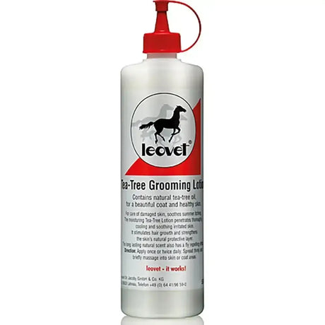 White plastic bottle with red cap and black horse silhouette label of leovet tea tree grooming lotion