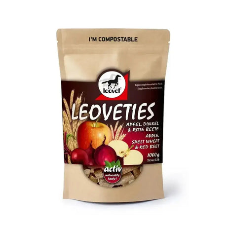 A tan compostable stand-up pouch of leoveties horse treats with a dark brown label carefully mixed with apples spelt wheat and red beet