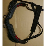 Black leather libbys driving saddle harness parts with red padded accents metal hardware and webbing tugs belly band