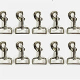 Shiny silver lightweight trigger clips made of metal arranged in two rows perfect as horse rug clips and horse tack accessories