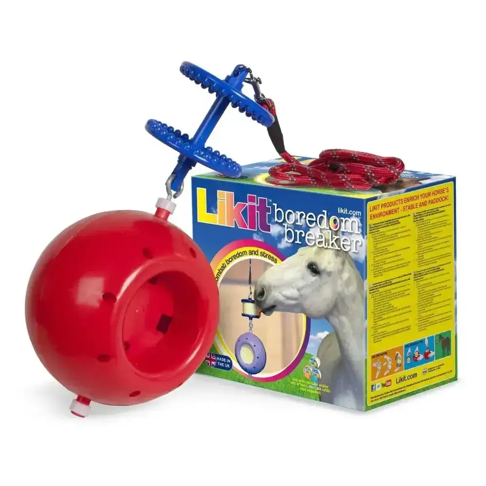 Red plastic likit boredom breaker ball with blue chewable attachment and red rope for horses to chew and play