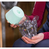 A mint green cylindrical foam ice pack with hollow center for likit treats boredom breaker relief refills 625g