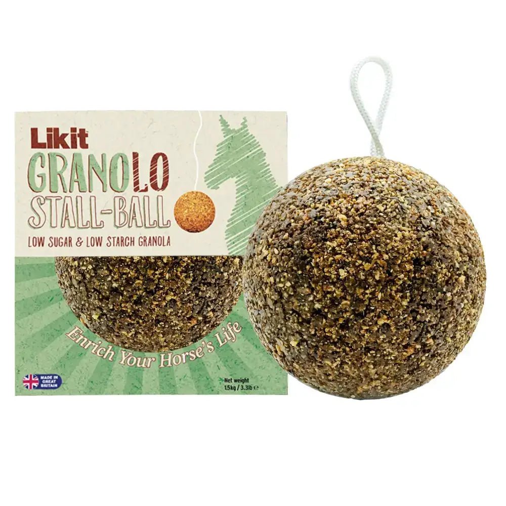A round textured brown likit granolo stall-ball with a white hanging loop for easy feeding