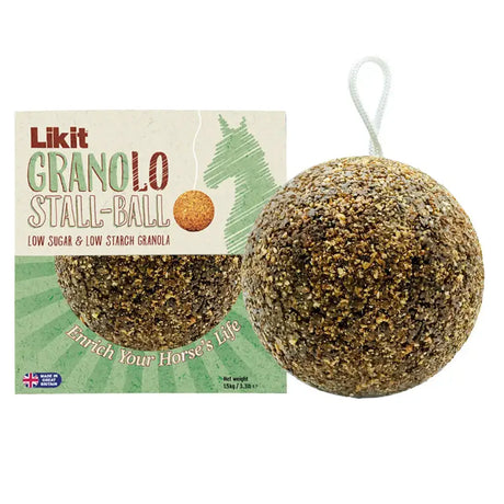 A round textured brown likit granolo stall-ball with a white hanging loop for easy feeding