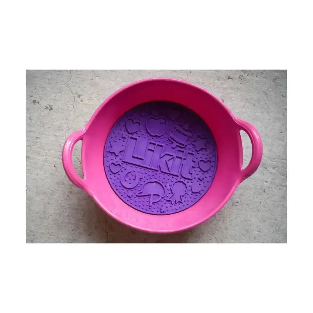 Pink plastic likit graze maze bowl with purple silicone slow feeding lick insert and playful embossed designs