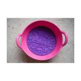 Pink plastic likit graze maze bowl with purple silicone slow feeding lick insert and playful embossed designs