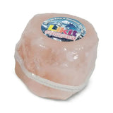 Pink himalayan rock salt block wrapped in clear plastic labeled as Likit natural himalayan rock salt lick