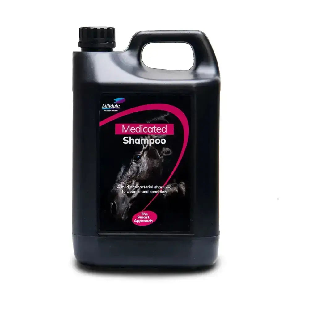 Black plastic jug of lillidale medicated shampoo with pink white label featuring horse and mild anti-bacterial agent