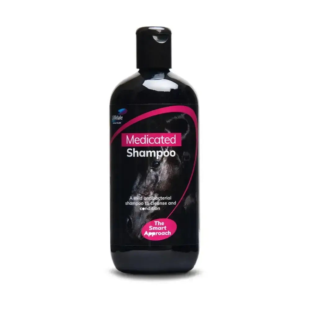 Black plastic bottle of lillidale medicated shampoo with pink label and mild anti-bacterial agent for skin care