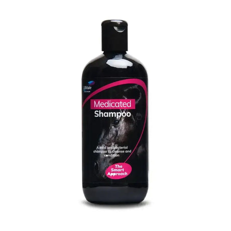 Black plastic bottle of lillidale medicated shampoo with pink label and mild anti-bacterial agent for skin care