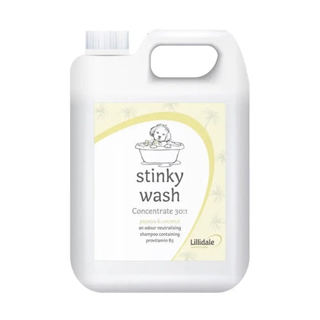 White plastic jug of lillidale stinky wash concentrate dog shampoo with papaya and coconut scent for dogs