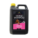 Black plastic jug with a yellow cap and handle labeled lincoln classic horse classic horse shampoo time favourites