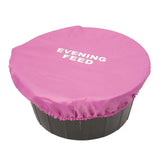 Pink lincoln evening feed bucket cover snugly fitted over dark gray plastic trough for feed bucket covers