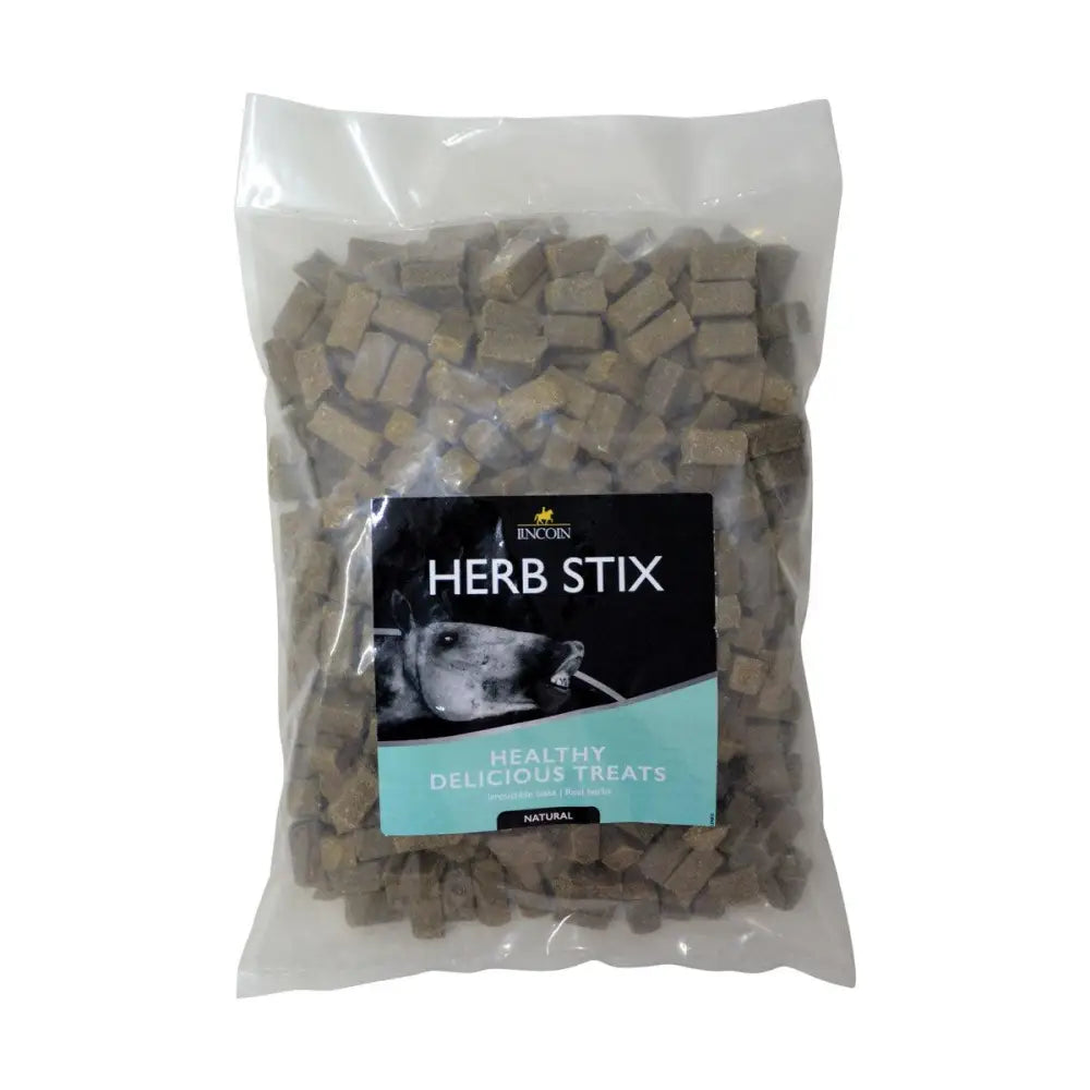 A clear plastic bag with beige cube-shaped lincoln herb stix dog treats from encoin for added palatability