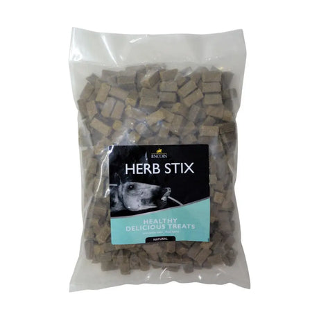 A clear plastic bag with beige cube-shaped lincoln herb stix dog treats from encoin for added palatability