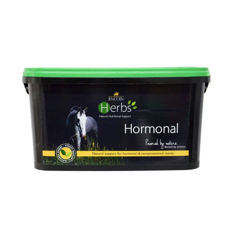 Black plastic tub with bright green lid labeled lincoln herbs hormonal scientific herbal horse hormone supplements for mares
