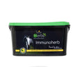 Black plastic tub with bright green lid labeled lincoln herbs immunoherb, a scientifically formulated herbal supplement for immune support supplements