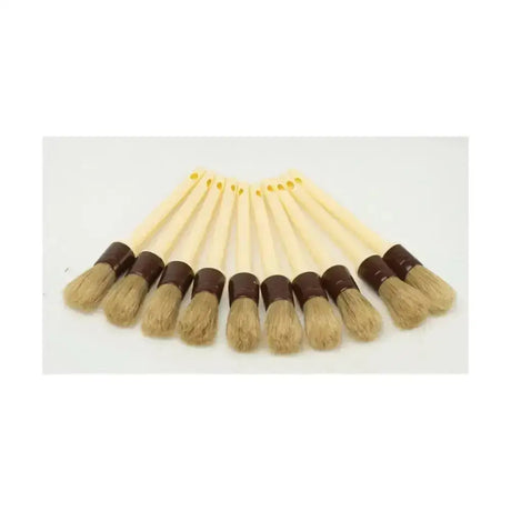 Set of ten cream-colored traditional hoof oil brushes with dark brown ferrules and natural bristles for lincoln hoof oil use