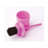 Pink plastic lincoln hoof oil brush with black bristles and matching container for easy hoof oil application