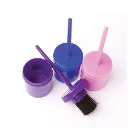 Purple plastic lincoln hoof oil brush with black bristles resting next to a matching open container oil brush complete