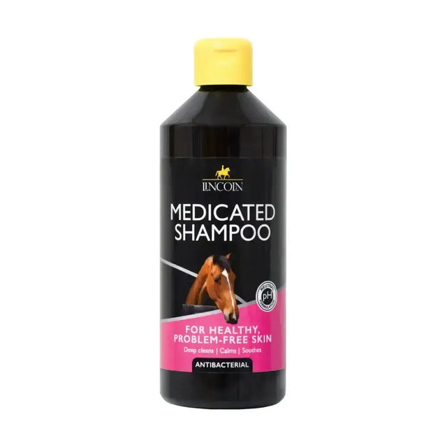 Black plastic bottle with yellow cap and pink lincoln label showing a horse for lincoln medicated shampoo to optimise coat