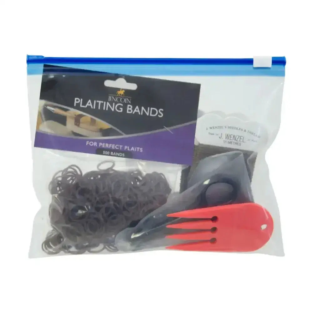 Red plastic plait aid with three prongs and black elastics in a clear bag from the lincoln plaiting kit with wenzel plaiting thread