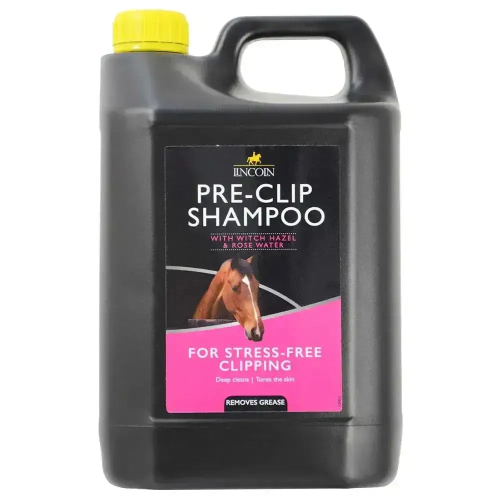 Black plastic jug with yellow cap and pink label of lincoln pre clip shampoo for time saving clipping