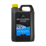 Black plastic jug with yellow cap labeled lincoln revitalising wash for cooling soothing muscles in horse grooming