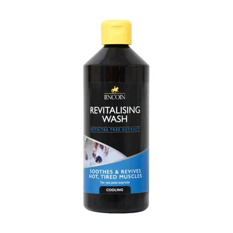 Black plastic bottle of lincoln revitalising wash with yellow cap and blue label featuring tea tree extract for horse grooming