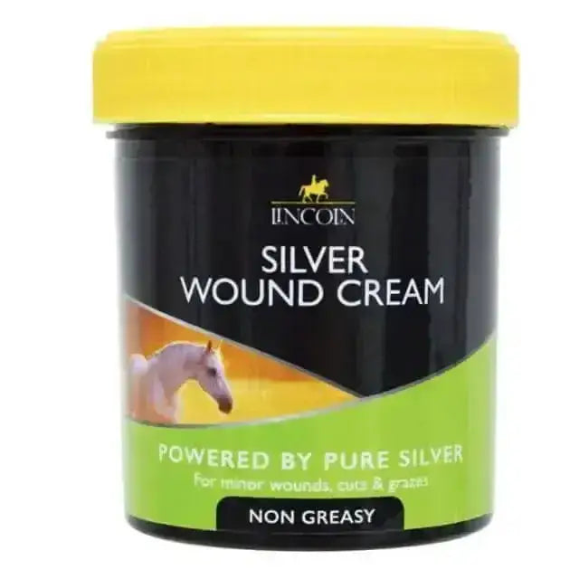 Black cylindrical lincoln silver wound cream container with bright yellow lid and green label for minor cuts and grazes