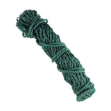 A tightly coiled dark green lincoln small mesh hay net made of small mesh polypropylene with matching ropes