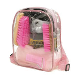 Pink transparent lincoln treat bag with pink straps holding horse grooming combs and brushes for christmas horse bix