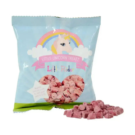 Little unicorn treatz beetroot flavoured mini-treats in pink heart candy pieces in a blue green unicorn bag